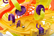 The Perplexus Original Maze Game is a clear sphere filled with multicolored .