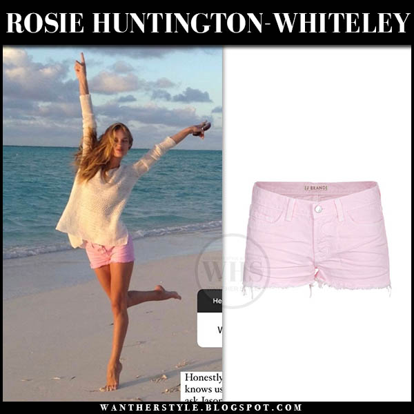 Rosie Huntington-Whiteley in white knit sweater and pink shorts