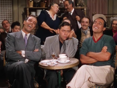 Jerry seeks advice from Henri (Georges Guétary), Lise's fiancé,
while Adam (Oscar Levant) wishes he was anywhere else.