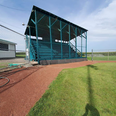 The rehabilitated wooden grandstand at walt Anderson field in Rippey IA