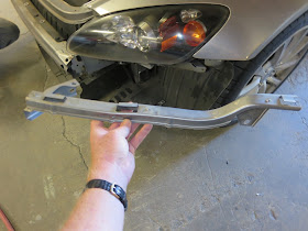 Replacing damaged bumper support bracket.