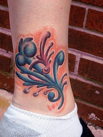 what is tattoo art tatto art picture gallery. Bold colorful ankle tattoo.