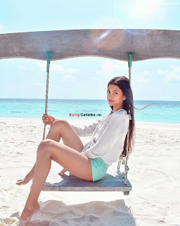 Alanna Panday in a lovely geen Shorts and White Shirt beach Side Pics (2) bollycelebs.in Exclusive Pics.jpg