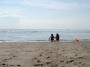 It makes me so happy to see my girls enjoying the same beach that I did at . (girls on beach together)