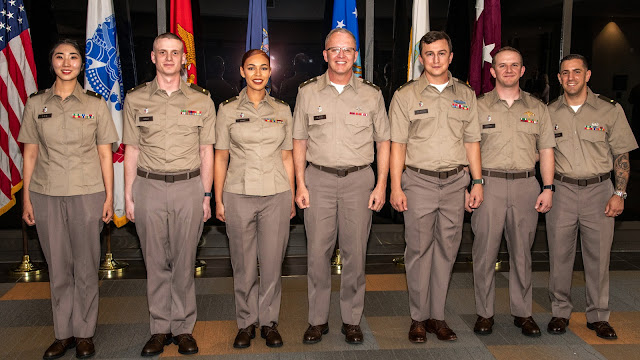 Lt. Isaiah Gray and 2nd Lt. Destiny Gray (2nd and 3rd from left, respectively) were among 25 other service  members in this year’s graduating class of EMDP2. The program began in 2014 to offer a select number of  enlisted service members a pathway to a career as a military physician. (Photo credit: Tom Balfour, USU)