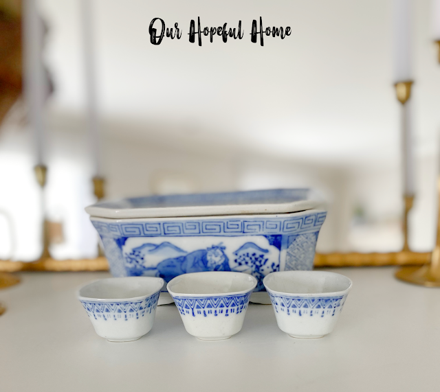 three porcelain pinch cups