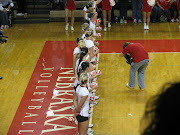 Nebraska Volleyball girls line up to get ready to play.