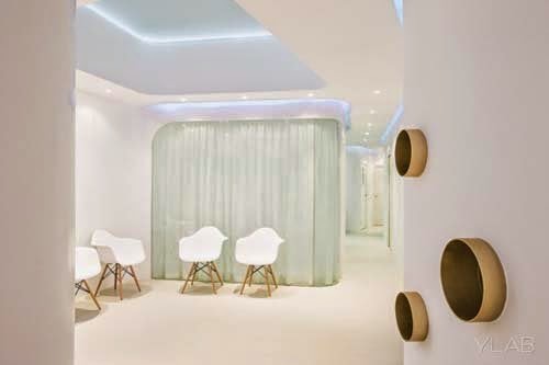 Modern dental office interior design by YLAB Arquitectos