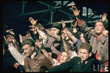 Excited crowds saluting at Graz, during Hitler's Austrian election campaign, April 1938