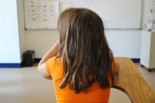 child at desk