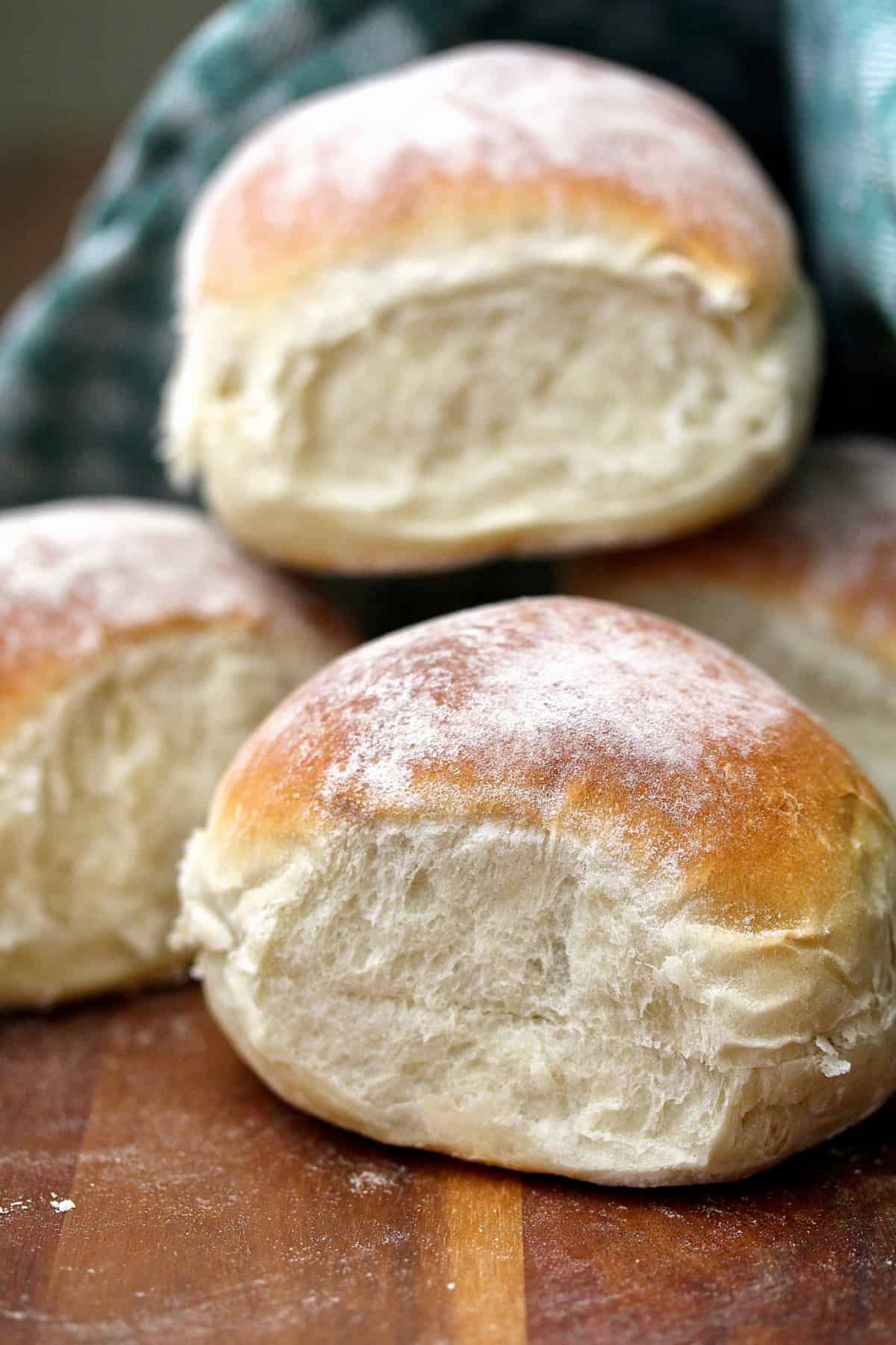 The Waterford Blaa rolls stacked on a cutting board.