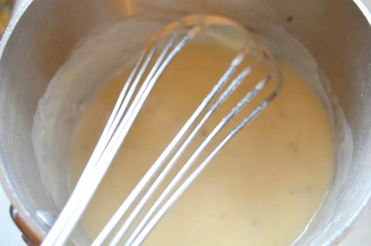 Chicken Stock Gravy in a saucepan. 