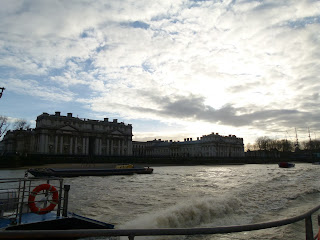 Old Royal Naval College frontage seen from a boat on the Thames