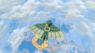 standing on a glider high above the large sky island