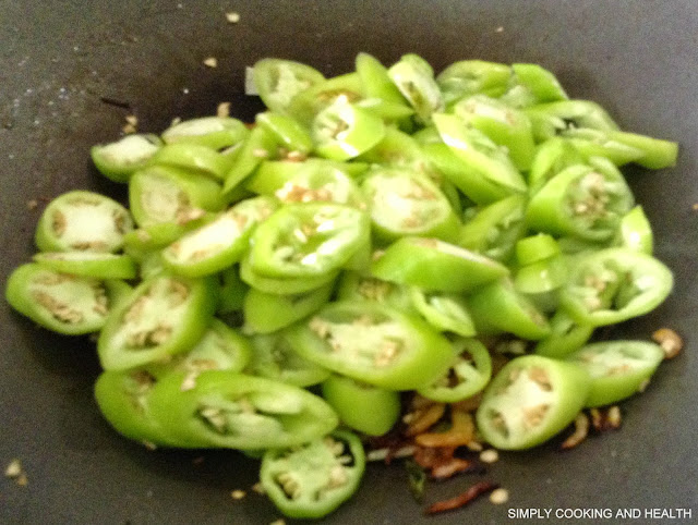 Adding curry chili pieces