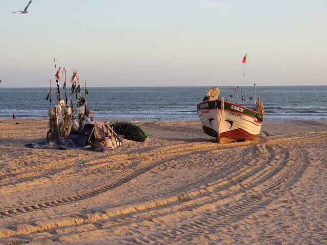 Fishing boat in Monte Gordo in the Algarve at sunset