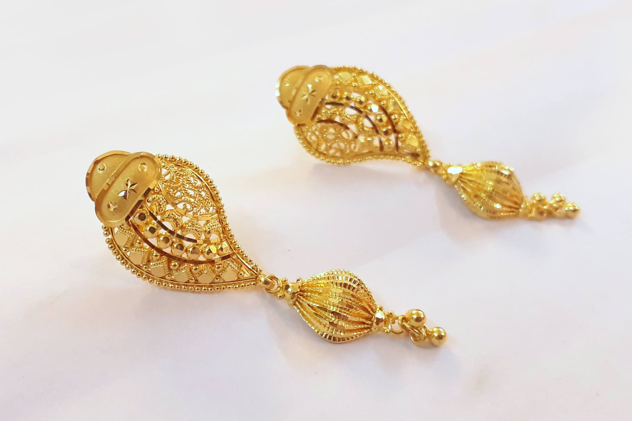 Gold Earrings designs,gold hoop earrings,gold drop long earrings,gold pinjada jhumka designs,gold chandbali earrings,gold Ear studs designs,Party wear earrings,Daily Wear gold earrings,fancy earrings designs,Latest new modles gold earrings,gold earrings huge designs,bridal gold earrings,gold studs designs,light weight gold earings designs,latest gold earings,daily wear gold stud designs,gold ear studs designs,Bridal Gold Long Earring Designs,latest ear studs