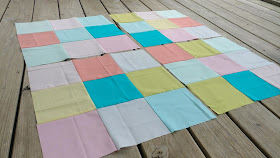 Nine patch blocks using Kona solids by Robert Kaufman