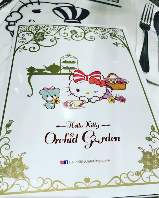 The adorable menu was on the table which had the Hello Kitty emblem.