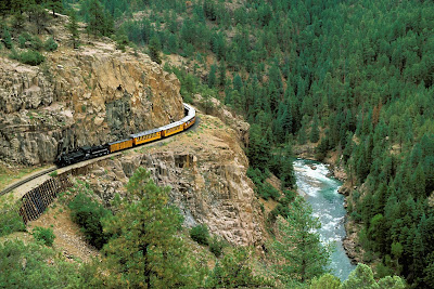 Passanger Train Crossing Mountain