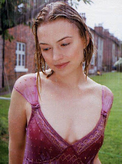 Sophia Myles Wet Photoshoots in Rain in Purple Top