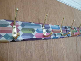 DIY wrapping paper coat hooks