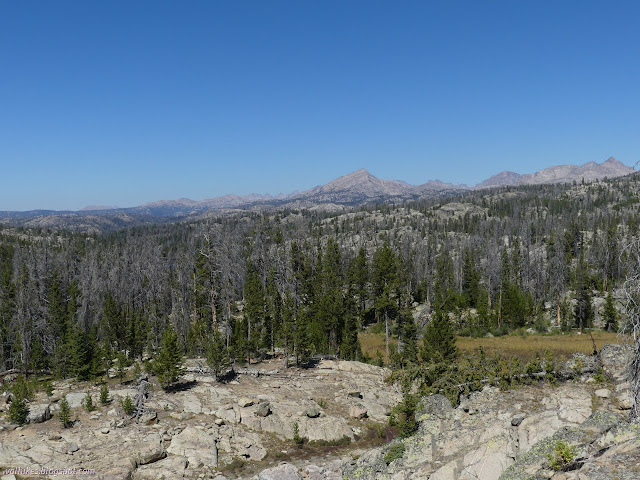 182: view across the distance to sharp peaks