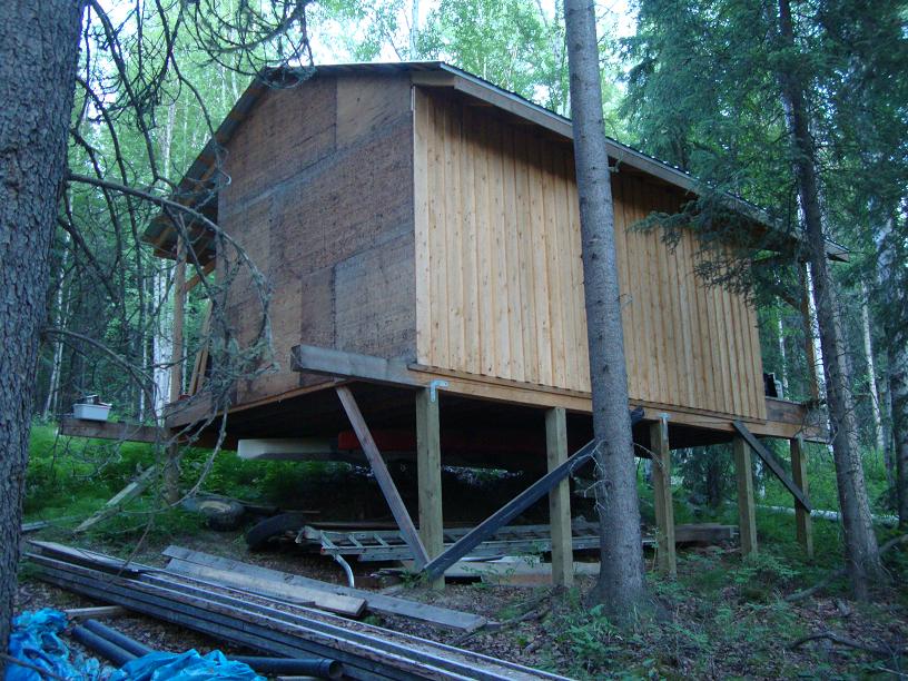  pole framed woodshed and a diagram of how to build a deck floor