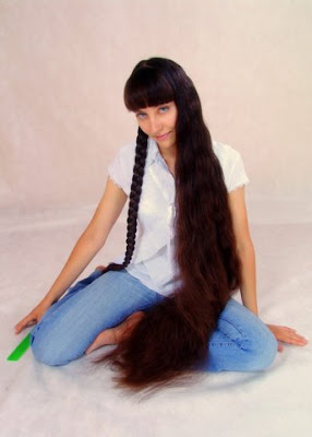floor length hair Rapunzel model twin braids