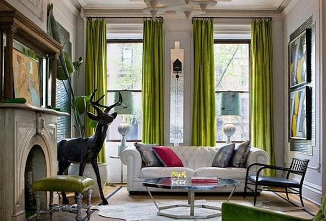 beautiful transitional living room pop of green color