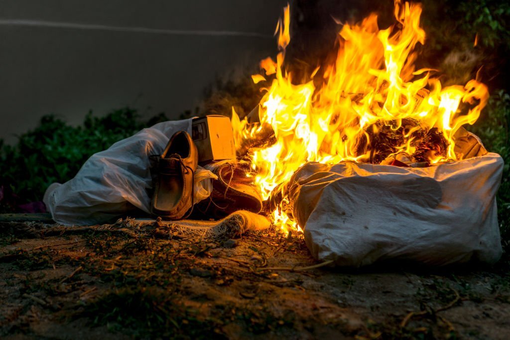 Plastic waste buring representative image