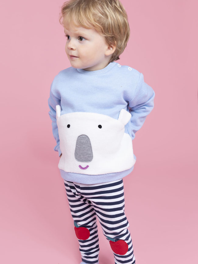 Young boy wears blue polar bear face sweatshirt