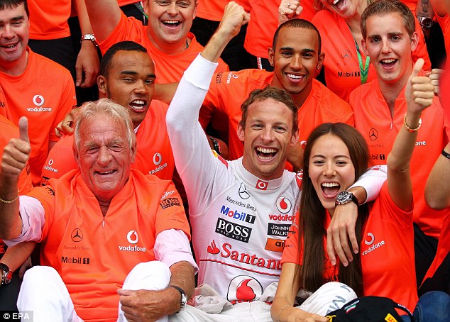 As he joined the McLaren team for a group celebration Button and Michibata 