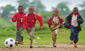 boys playing with soccer ball