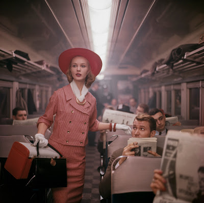 color photo of fashion model on NY commuter train, 1960