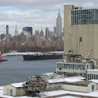 Snow Boat Domino - A tug and barge pass the Domino plant in Williamsburg.