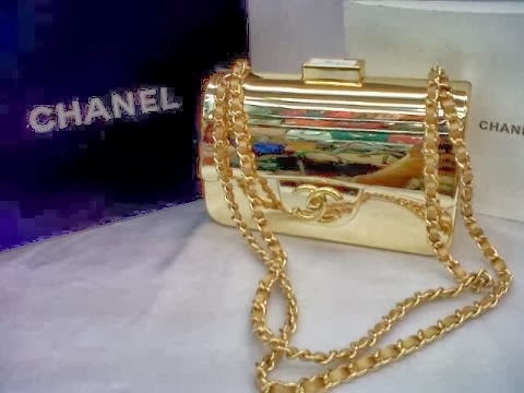 Cod e: Chanel 24K Gold Tone Clutch Bag