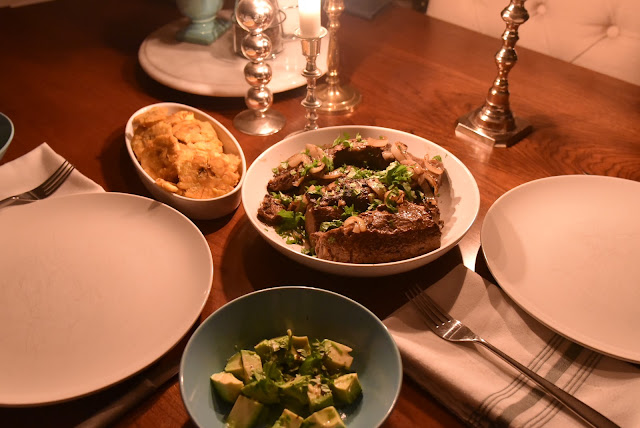 Paleo Puerto Rican dinner of steak tips, tostones and avocado salad