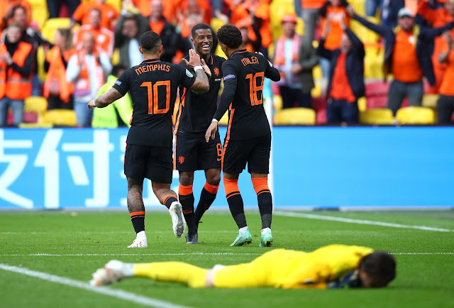 Depay, Wijnaldum, Malen celebrating for Netherlands at Euro 2020