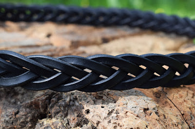 Detail of the 5 thongs braided leather mens belt