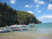 They said that it's the best place to go for uncrowded island paradise so . (boats and beach )