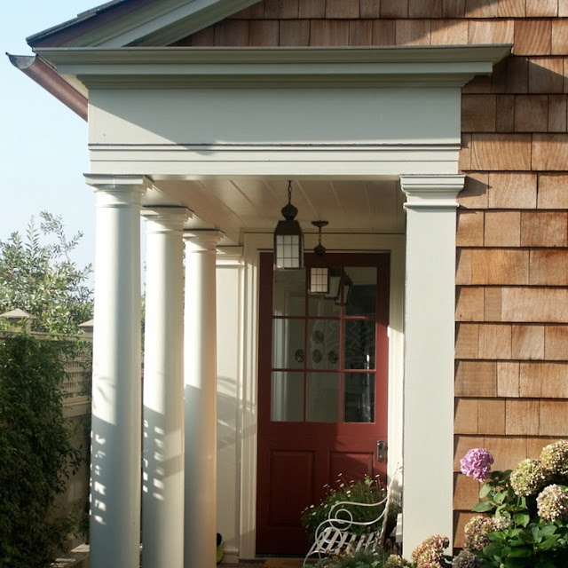 Red door on Malibu beach house (shingle style) by Giannetti Home