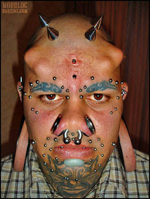 extreme body piercing and implants