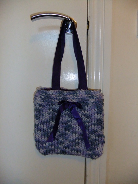 I lined it with Cadburys purple fabric and added a cadburys purple ribbon to