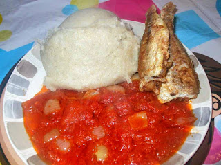 Banku with fried fish and stew