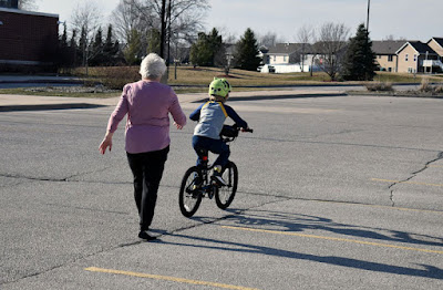 Boy riding bicycle