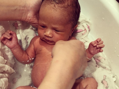 Chrissy Teigen shares adorable photo of baby Luna taking a bath