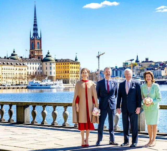 Queen Mary wore a red silk dress by Raquel Diniz, Crown Princess Victoria wore a pink cady dress by Roland Mouret Princess Sofia