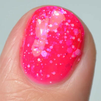 bright pink nail polish close up swatch