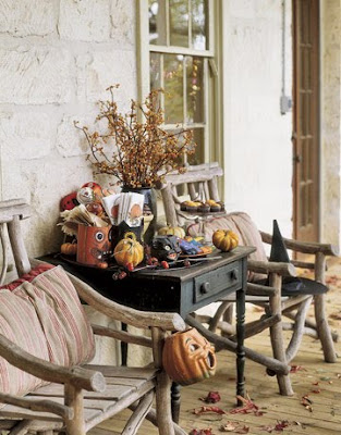 When decorating a porch for fall use bales of straw or hay 